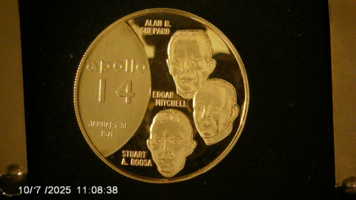 Silver-Round-With-An-Apollo-16-Motif--Design.